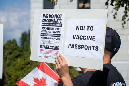 Vancouver, Canada - September 8,2021: View of sign No to Vaccine Passports during the rally against the BC Vaccine Card in front of Vancouver City Hallのeditorial素材