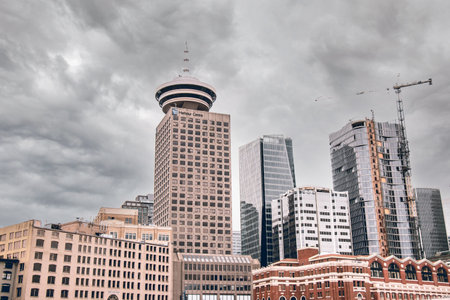 Vancouver, Canada - November 20,2021: View of Harbour Centre Tower and Waterfront Train Station