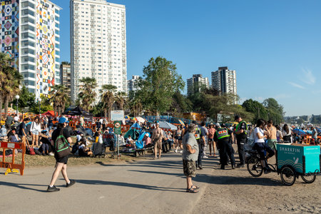 English Bay Beach full of people hours  before Celebration of light fireworks showのeditorial素材