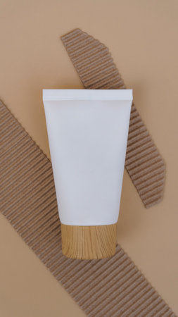Cosmetics mock-up. white bottles lie on a beige background on a textured stone. beautiful...