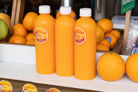 Bottles and fruits displayed in the shop windowのeditorial素材