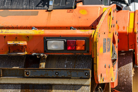 The side of the orange vehicle features a hamm logoのeditorial素材