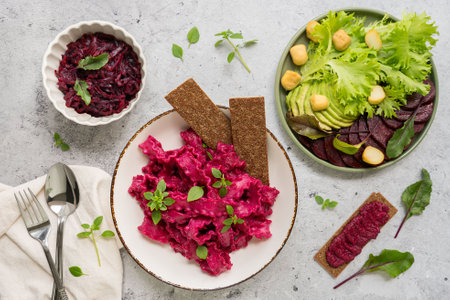 Enjoy Vibrant Beetroot Salad bursting with Fresh Greens and topped with Crunchy Crackersの写真素材