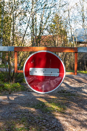 traffic restriction sign on a small road in a small villageの写真素材
