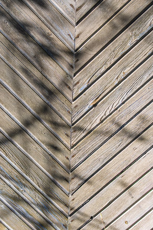 texture of old wooden covering consisting of many wooden elementsの写真素材