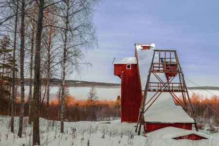 Mining tower from the time of ore mining in central Sweden on a winter's dayの写真素材