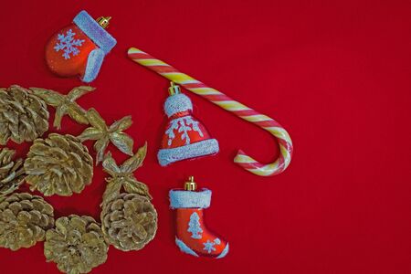 Christmas composition of Santa Claus clothes decoration on red background.の写真素材