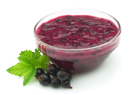 Berry jam with currant branchの写真素材