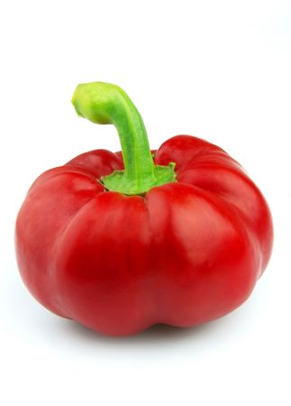 Beautiful red pepper close up on a white backgroundの写真素材