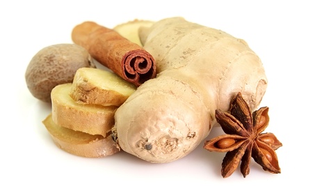Ginger, nutmeg, cinnamon, anise on a white backgroundの写真素材