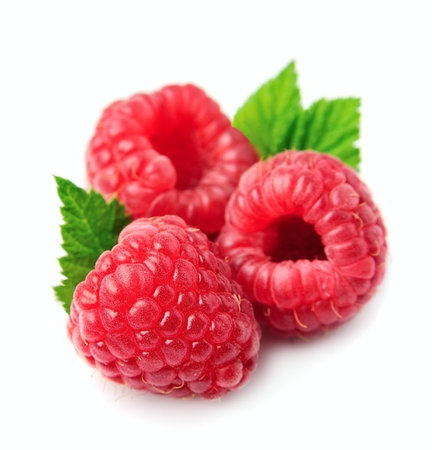 Sweet raspberry with leaves macro isolated on white backgrounds.