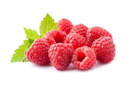 Sweet raspberry with leaves on white backgrounds.Healthy food ingredient.