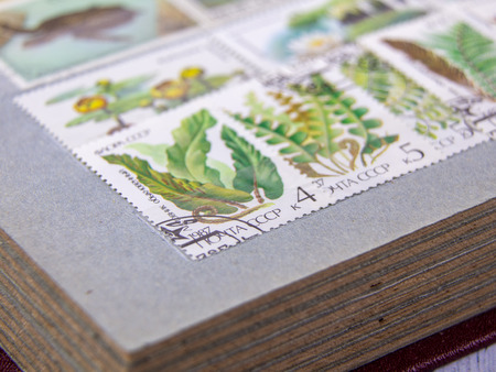 Russia, Krasnodar - September 19, 2019. A collection of stamps from different countries.のeditorial素材