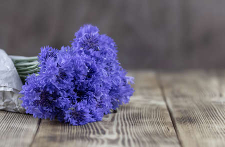 Bouquet of bright blue flowers. Bouquet of wildflowers on a white background.の写真素材