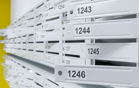 Walls with mailboxes in a new modern high-rise building.の写真素材