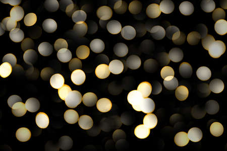 Photo of bokeh lights on black background. New Year bokeh.の写真素材