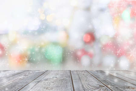 Christmas blurred background and wooden table.の写真素材