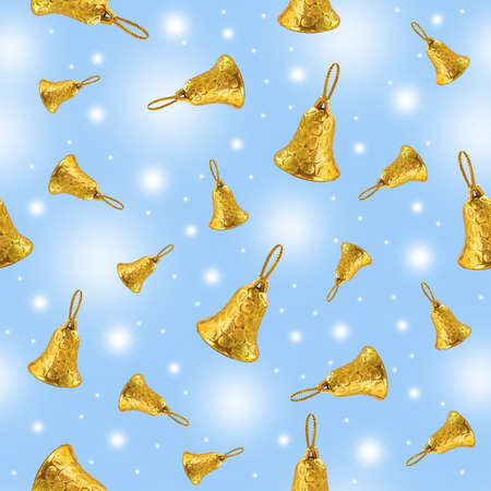 Seamless background on the theme of Christmas and New Year. Christmas background with yellow bells on a blue background. Printing on paper, fabric or wallpaperの写真素材