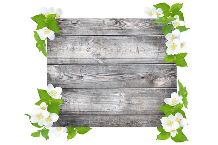 Round frame from white chamomile flowers on a white background. Mock up greeting card with daisies.の写真素材