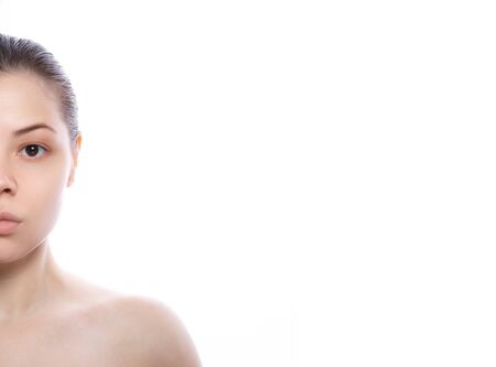 Beauty half face of a young woman.の写真素材