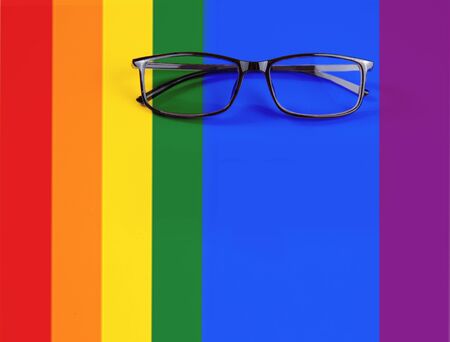 glasses on rainbow color background.High quality photoの写真素材