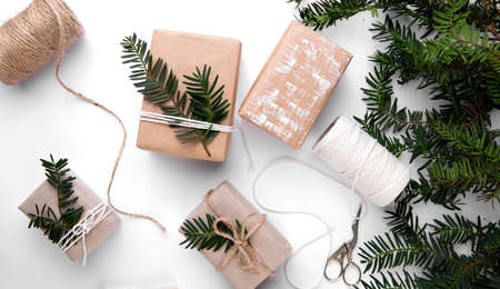 Hand made gifts for Christmas on white tableの写真素材