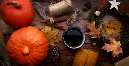 Autumn Flat lay composition with pumpkins on wooden backgroundの写真素材