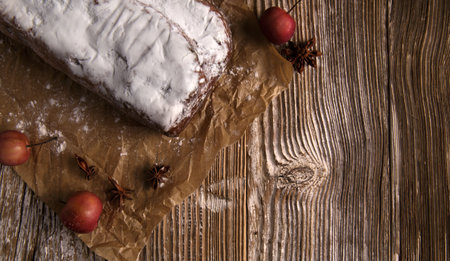 Christmas cupcake, star anise and red apples on wooden table. selective focusの写真素材