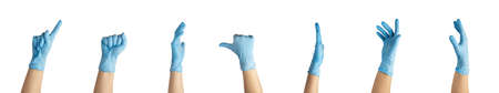 several hands in blue gloves of nitrile show fingers different gestures. isolated on the white background .High quality photoの写真素材