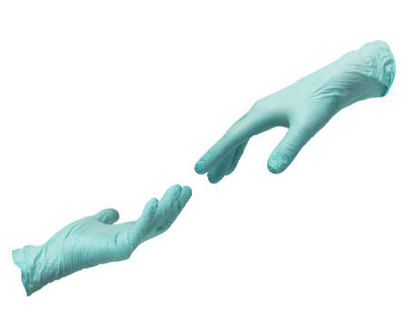 Two hands in sterile mint-colored nitrile gloves reach out to each other. Skin protection during epidemics and quarantine. There is a place for text. High quality photoの写真素材