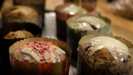 freshly baked cupcake with icing sugar in a paper baking dish. selective focus.High quality photoの写真素材
