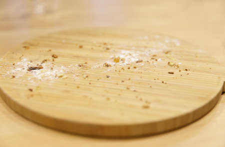 wooden board on which there were crumbs from the cupcake. selective focus.High quality photoの写真素材