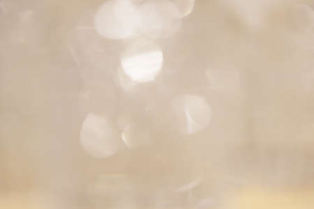 light background with blurred sparkles in a soft style. no focus. High quality photoの写真素材