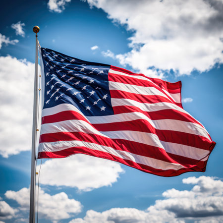 the American flag develops against the background of a blue sky with clouds. generative AIの素材