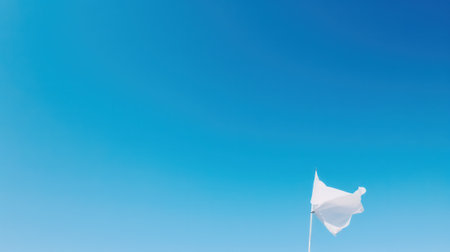 white waving flag against a blue sky with clouds. Generative AIの素材