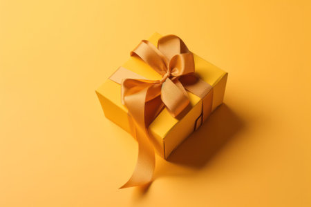 gift box tied with a silk ribbon on a yellow background postcard .Free space for your text.Generative AIの素材