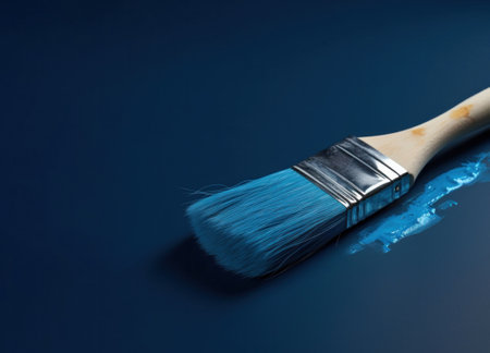 Paint brush with blue paint on blue background. Generative AIの素材