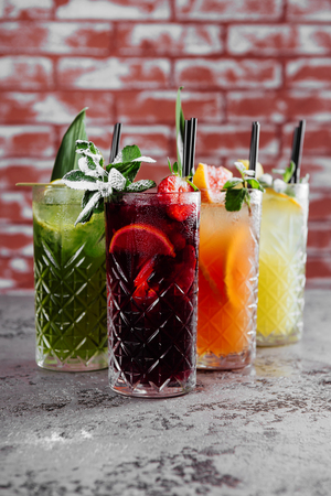 Four fruit cocktails on table.の写真素材