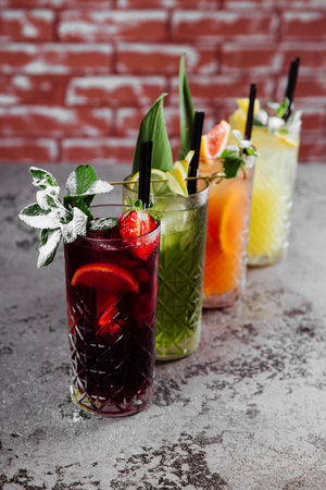 Four fruit cocktails on table.の写真素材