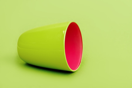 green cup on a green backgroundの写真素材