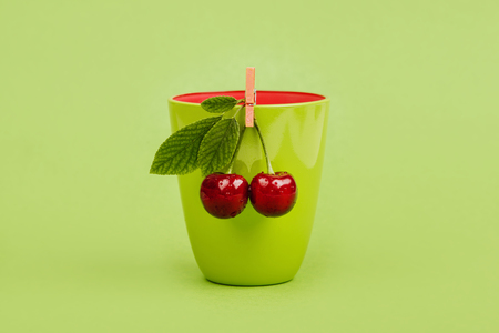 cherries on green backgroundの写真素材