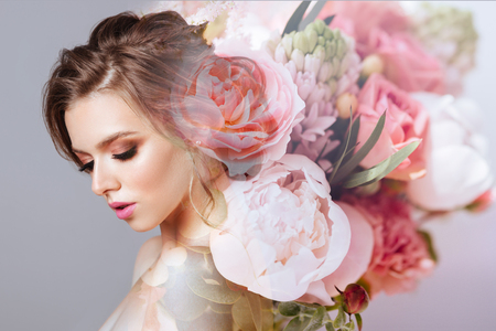 Fashion model posing at studio with makeupの写真素材