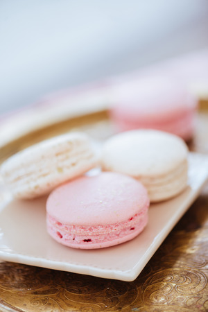 Multicolored macaroon on a plateの写真素材