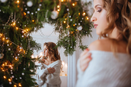 Christmas. Beautiful smiling woman.の写真素材
