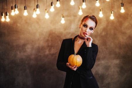 Portrait of young beautiful girl with make-up on her faceの写真素材