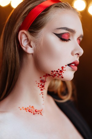 Halloween portrait of young beautiful girl