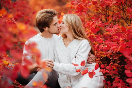 couple is hugging and sitting closeの写真素材