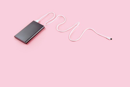 power bank gadget on a pastel background.