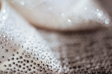 silver and white bokeh lights defocused.の写真素材