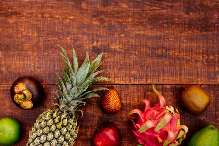 Tropical fruits background, many colorful ripe tropical fruitsの写真素材